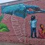 Граффити на фасад е Дома ветеранов создают в Иркутске