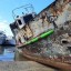Полузатопленный корабль в Хужирском порту создает угрозу загрязнения Байкала